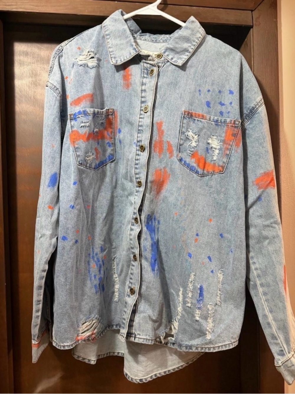 Light Blue Distressed Denim Button-Down Shirt with Blue & Orange Paint Accents